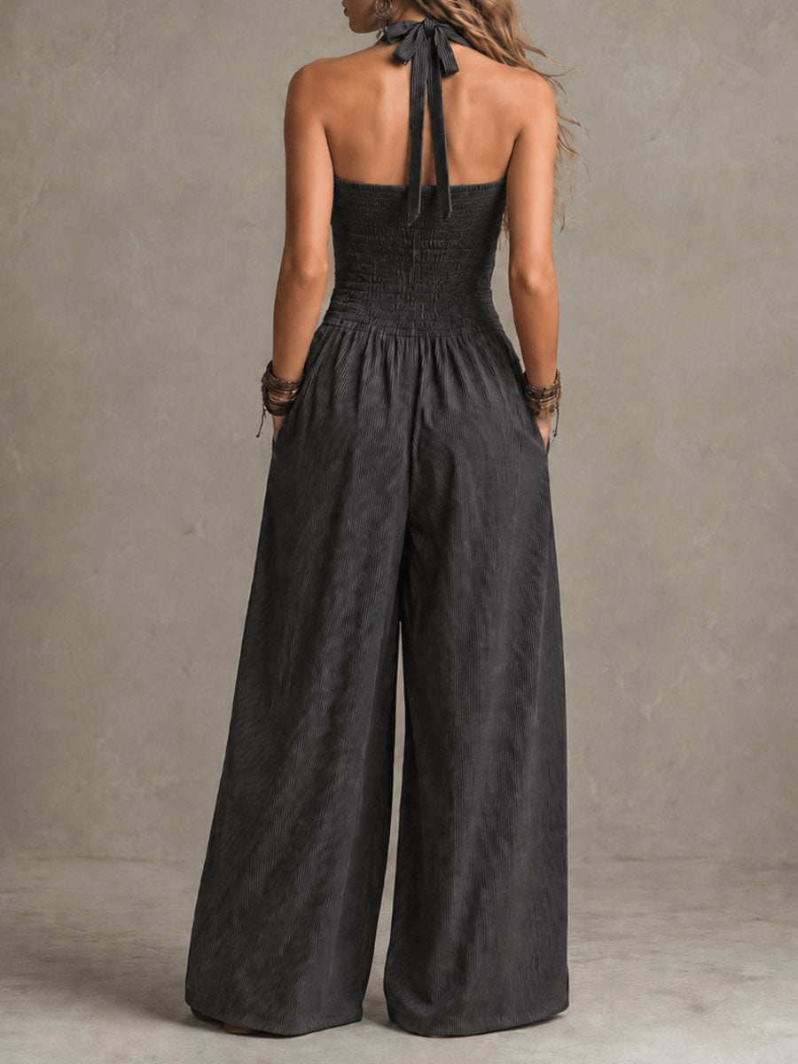 Valentina - Mono bohemio de pierna ancha con tirantes cruzados y escote halter, estampado de rayas diplomáticas.