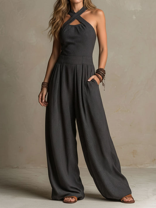 Valentina - Mono bohemio de pierna ancha con tirantes cruzados y escote halter, estampado de rayas diplomáticas.