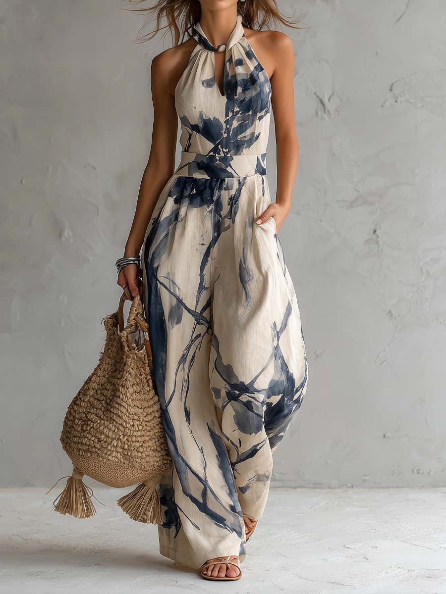 Adriana - Mono de pierna ancha con estampado de lavado a la tinta y cuello halter, con bolsillos.
