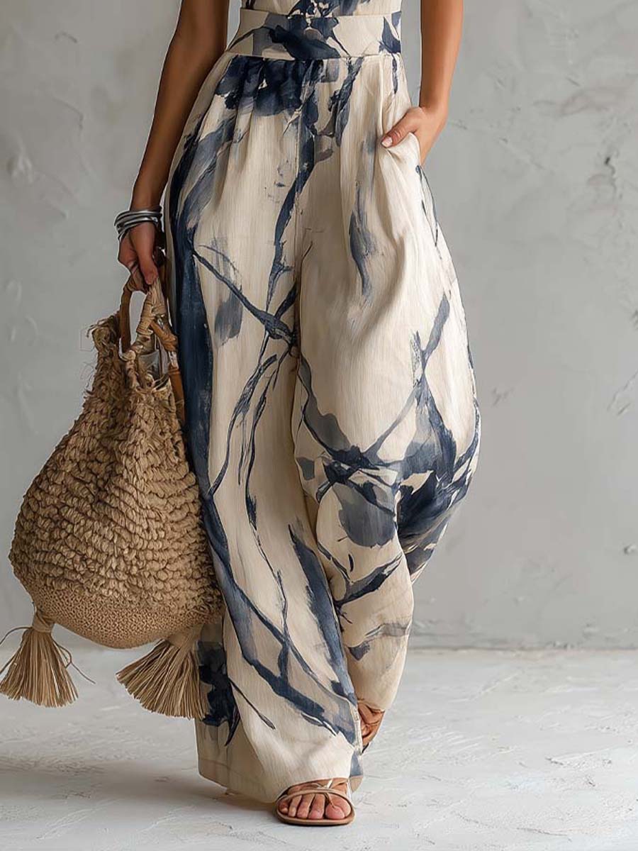 Adriana - Mono de pierna ancha con estampado de lavado a la tinta y cuello halter, con bolsillos.